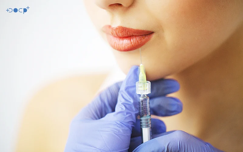 Woman Getting Inject With a Syringe To Her Lips