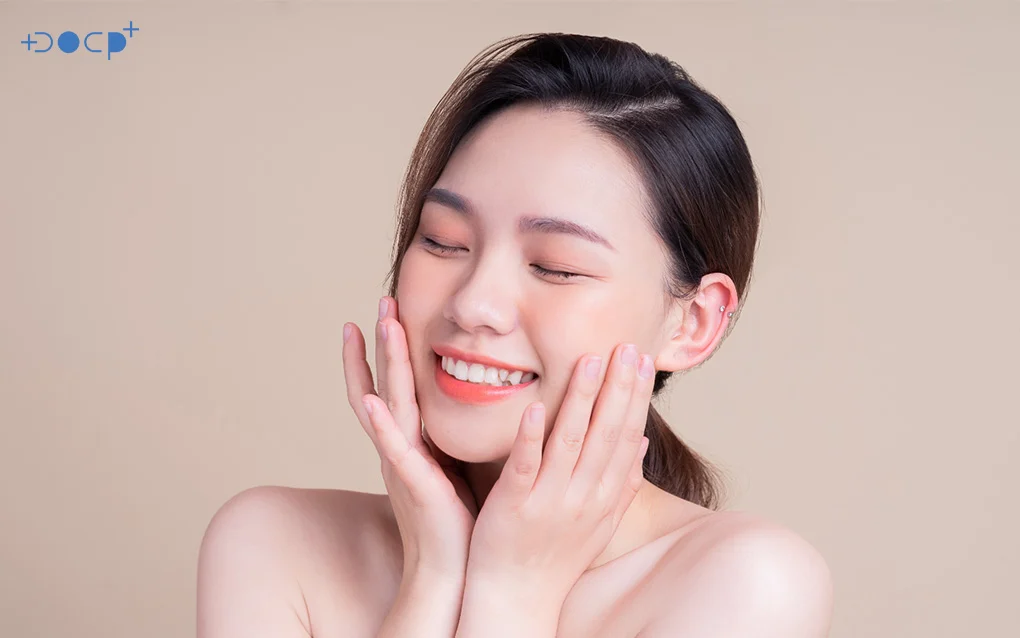 Woman Smiling With Happiness while Touching Both Of Her Cheek